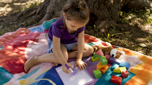 Child practicing writing in magic ink book